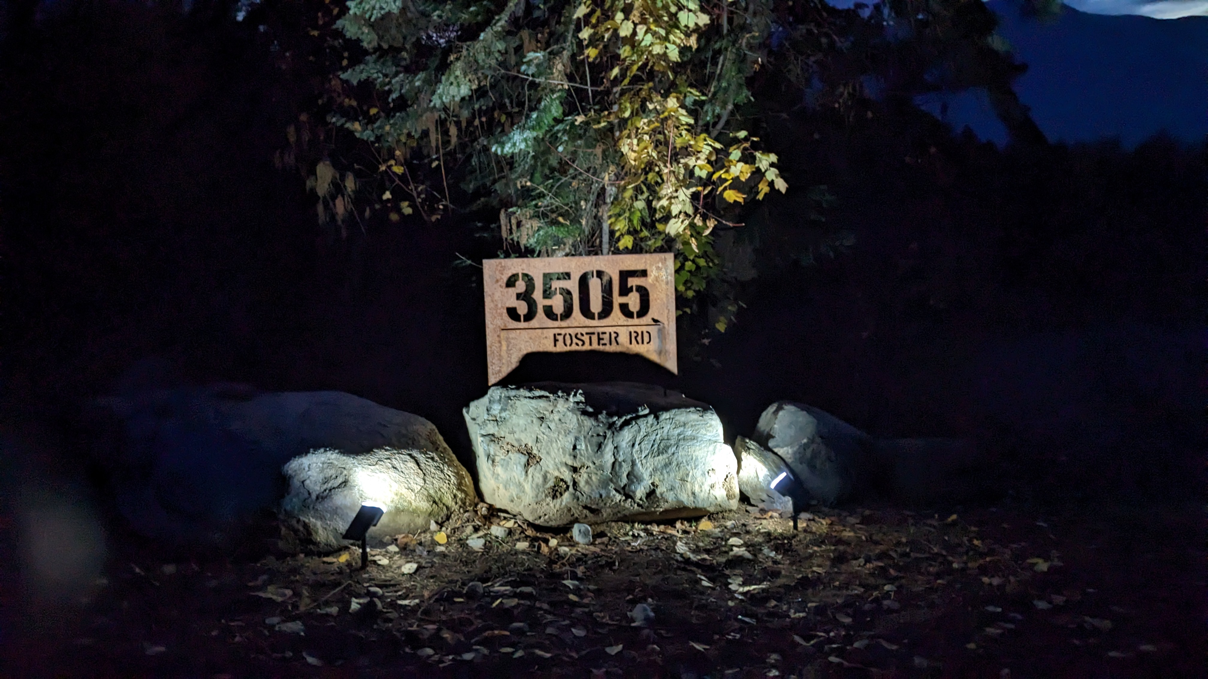 Property address sign at night